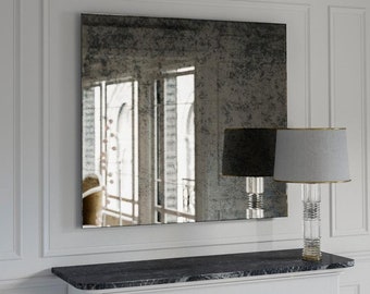 Antiqued wall mirror. Frameless antiqued mirror with hand-made finish. Custom antiqued wall mirror.