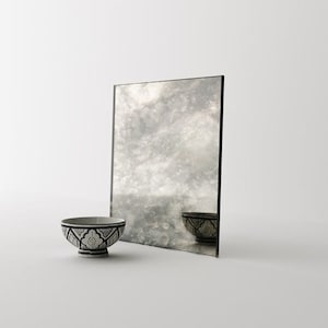 15" x 15" Antiqued Italian Inspired Mirror. Give your interior project a unique look. Handmade antiqued glass mirror by Mirror Coop.