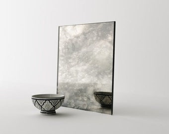 15" x 15" Antiqued Italian Inspired Mirror. Give your interior project a unique look. Handmade antiqued glass mirror by Mirror Coop.