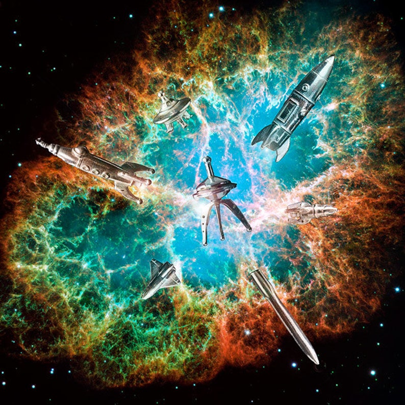 May include: A collection of silver toy spaceships and flying saucers against a colorful nebula background. The nebula is a mix of blue, green, orange, and red colors.