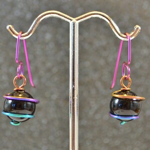 Rainbow Niobium And Black Onyx Wrapped Bead Earrings - Anodized wire, genuine gemstone beads, non-plated, nickel free, hypoallergenic.