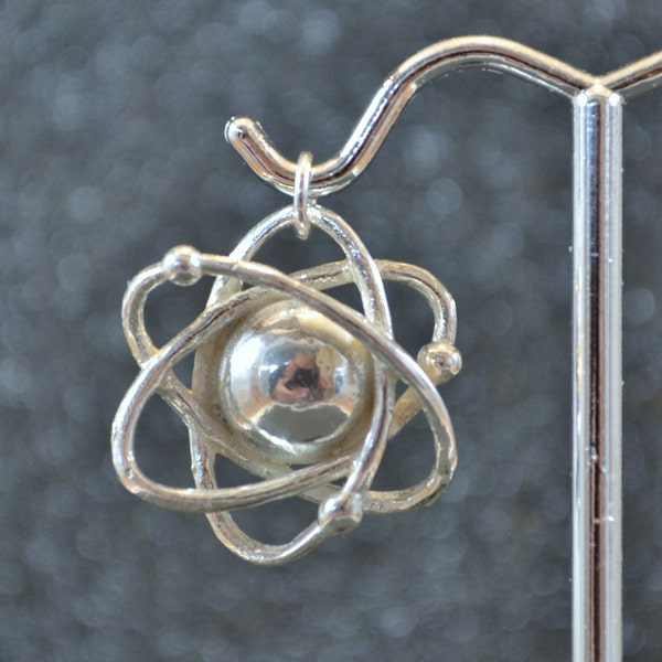 Hollow Cast Dimensional Atom Pendant - Sterling silver stylized subatomic structure models, non-plated, nickel free and hypoallergenic.