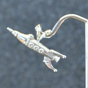 Cast &quot;In Flight&quot; Retro Rocket Pendant Or Charm -  Silver 3D outer space exploration vehicles, NASA inspired, no nickel and hypoallergenic.