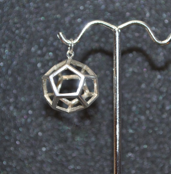 Cast Dodecahedron Pendant Or Charm (d12) - Silver 3D, geometric, platonic "solid" wire outlines, non-plated, nickel free and hypoallergenic.