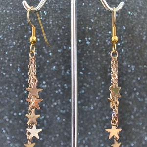Shooting Star Shower Dangle Earrings - 14/20 yellow gold fill, tiny stars, simple and dainty, non-plated, nickel free and hypoallergenic.