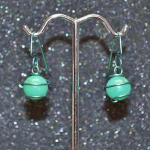 Green Niobium and Chrysoprase Wrapped Bead Earrings.  Green anodized wire, genuine gemstone beads, handmade, nickel free and hypoallergenic.