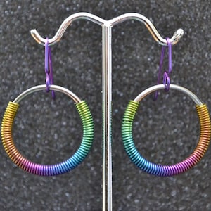 Multicolor Niobium 1 1/16&quot; (28 mm) Dangle Coil Circle Earrings - Rainbow anodized, arc welded, nickel free and hypoallergenic.