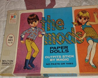 Muñecos de papel vintage de Milton Bradley de 1967, modelo The Mods. ¡Niño y niña de ojos grandes! ¡Súper raros!