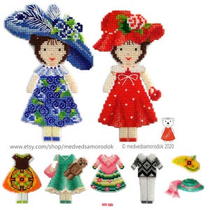 Peut inclure: Deux motifs de point de croix représentant des filles portant des robes et des chapeaux. La fille de gauche porte une robe bleue à motif floral et un chapeau bleu avec une plume. La fille de droite porte une robe rouge à pois blancs et un chapeau rouge avec une fleur. Les motifs comprennent des vêtements et des accessoires supplémentaires pour les filles.