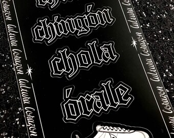 May include: A set of five black and white stickers with Spanish words and a white sneaker with a black swoosh on a black background.