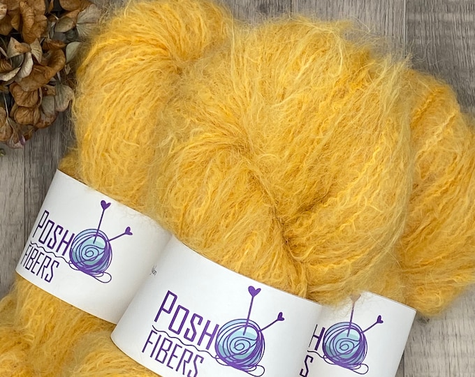 Featured listing image: Fuzzy Posh. Sunglow yellow. Suri alpaca wool yarn with Merino and Nylon. Hand Dyed Yarn. Hand Dyed Alpaca. DK weight. Knit. Crochet. Weave.