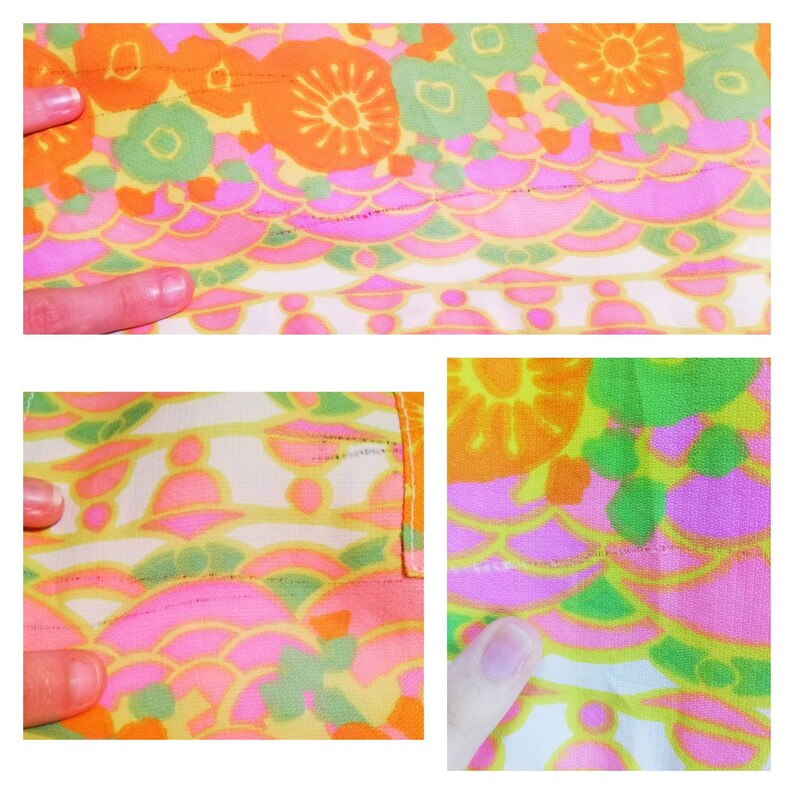 May include: Close-up of a colorful fabric with a repeating pattern of flowers and geometric shapes in shades of pink, orange, green, and yellow.