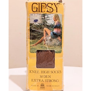 May include: Vintage Gipsy knee-high socks in a box. The box is yellow with the brand name and a picture of a woman. The text on the box reads "Knee High Socks 30 Den Extra Strong". Made in Italy.