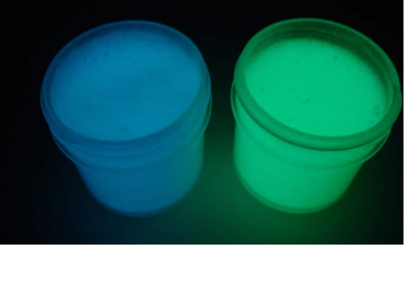 May include: Two small containers of glow-in-the-dark paint. One container is blue and the other is green.