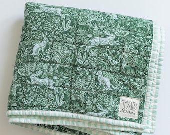 Modern heirloom baby quilt, baby shower gift for boy, Rifle Paper Co wholecloth quilt, woodland rabbits and green gingham crib blanket