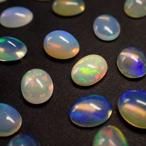 ONE Opal cabocohon from Ethiopia - fire flash oval polished stone loose natural birthstone
