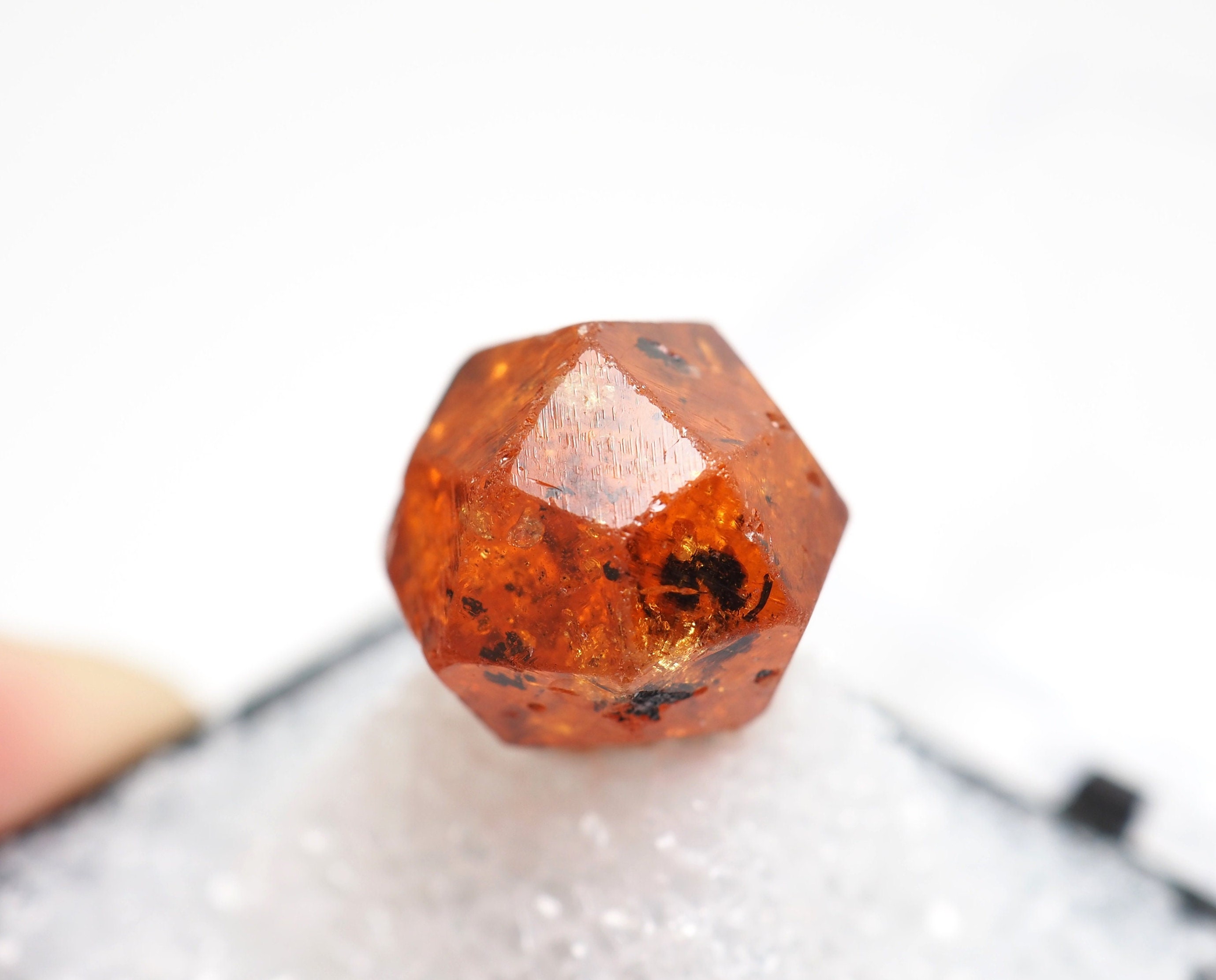 Spessartine Garnet crystal from Loliondo, Tanzania - 5.5gm / 15mm x 15mm x 13mm (F84034)