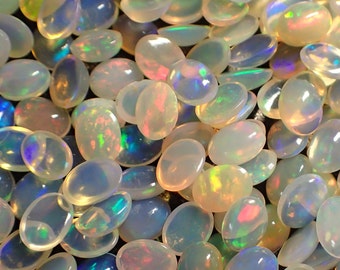 ONE Opal cabocohon from Ethiopia - appx. 8x6mm / appx. .75ct each - fire flash oval polished stone loose natural birthstone