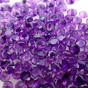 Amethyst gemstone from Uruguay - purple round natural stone