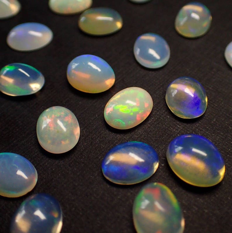 ONE Opal cabocohon from Ethiopia fire flash oval polished stone loose natural birthstone image 1