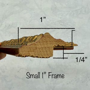 May include: A cross-section of a small picture frame, 1 inch wide and 1/4 inch thick, with a gold-colored, ornate edge. The text "Small 1" Frame" is visible.