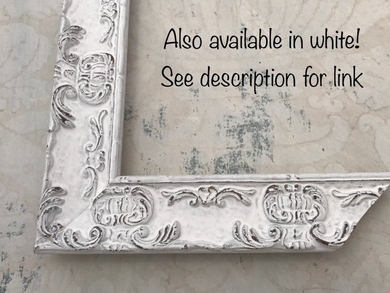 May include: White ornate picture frame with a decorative, raised design. The frame is made of wood and has a distressed finish. Also available in white! See description for link.