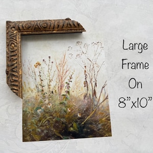 May include: A framed artwork featuring a watercolor painting of tall grasses and wildflowers in muted tones of green, brown, and beige. The frame is ornate, with a gold finish. The artwork is 8" x 10". Text on the image reads "Large Frame On 8"x10".