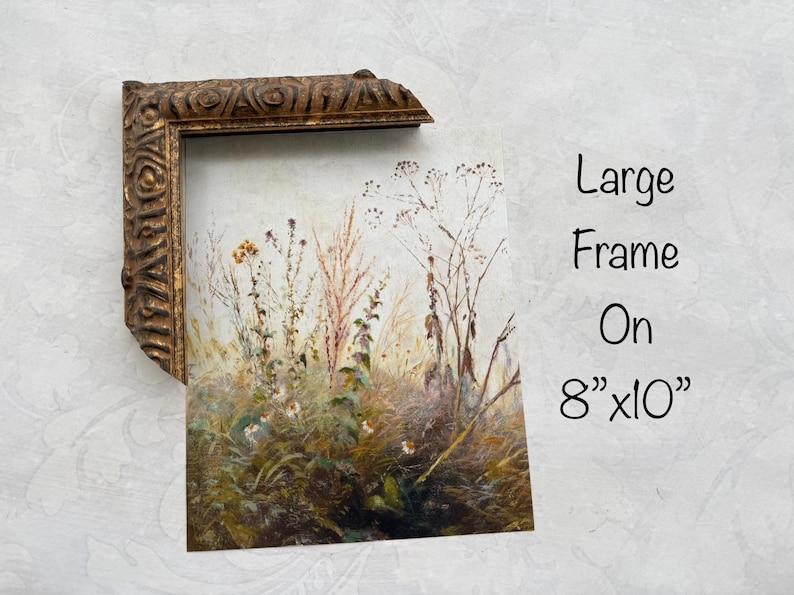 May include: A framed artwork featuring a watercolor painting of tall grasses and wildflowers in muted tones of green, brown, and beige. The frame is ornate, with a gold finish. The artwork is 8" x 10". Text on the image reads "Large Frame On 8"x10".