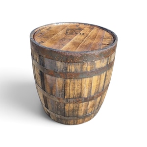 May include: A cylindrical wooden barrel featuring vertical staves with a natural light brown grain. The barrel is secured by three dark, weathered metal hoops showing signs of oxidation. The top lid displays black stamped text reading B 12 B 23.