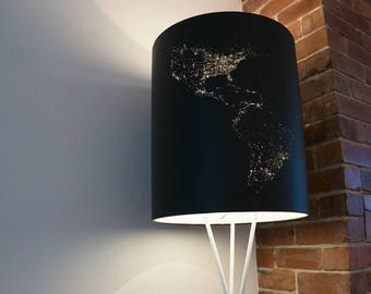 Solar Eclipse Floor Lamp: modern floor lamp, Tripod floor lamp, contemporary standard lamp, unique, black, white, brass, globe lights