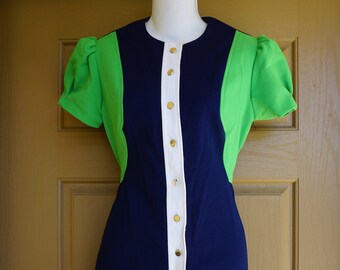 Vintage 1960s  short mod dress that buttons up th front 60s