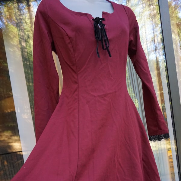 Hot Topic burgundy stretchy dress size medium with laces at the bust and back of waist