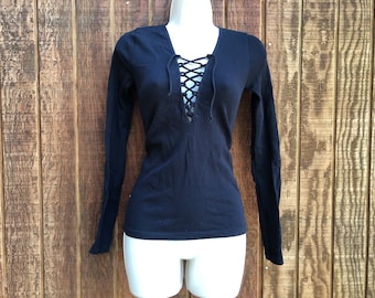 Free People pullover size M/L medium large long sleeve shirt with laces stretchy