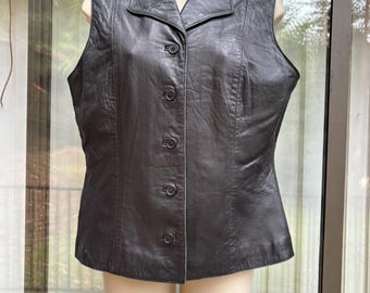 black leather vest top that buttons in the front Size medium Motorcycle biker style 90s 1990s