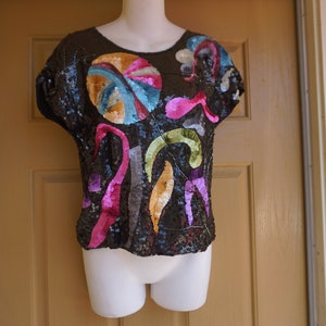 black abstract art sequin top by Metamorphosis labeled large fits small sparkly party wear shirt 80s 1980s