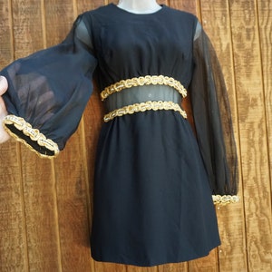 Vintage 1960s long sheer sleeve black and gold dress 60s