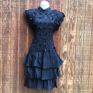 Vintage 80s 90s textured black prom dress small size medium by a la carte with layered ruffles and cut out back