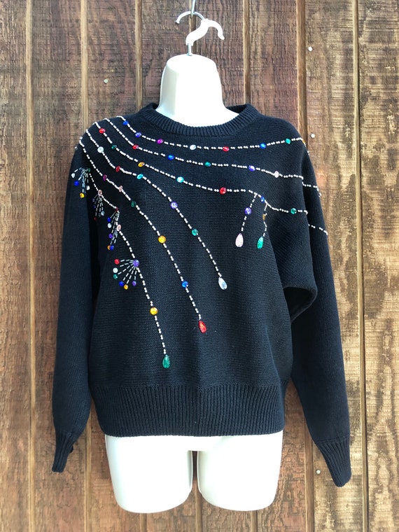 Black knit beaded and jeweled sweater size Medium 