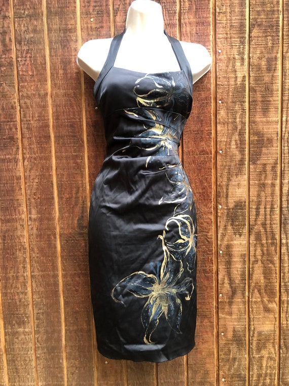 Cache tight stretchy and gold floral dress size 4 