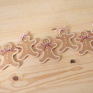 Julpepparkaksgubbe Kakbanderoll Girlang | Filt & Rosetter Söt Julmanteldekoration