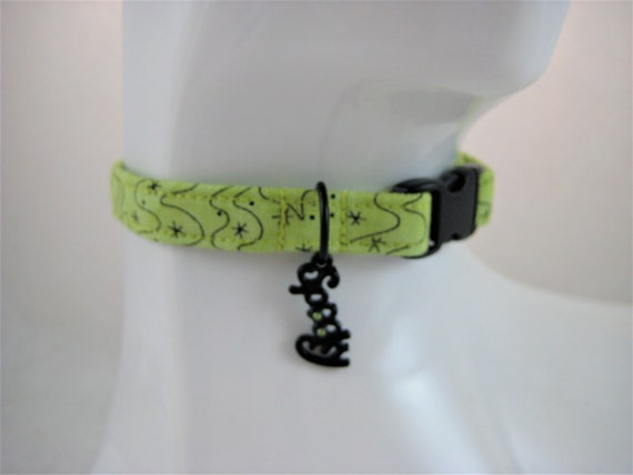 Cat Collar - Chartruse with Black Wavy Lines and Stars with a Black Spooky Green Charm -Scary Halloween Safety Release Collar for your Kitty