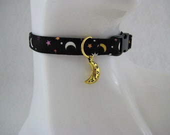 Cat Collar -  Black with Glow-in-the-Dark Yellow, White Moons and Purple Stars with Gold Moon Charm - Safety Release collar for your Kitty