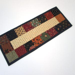 Quilted Table Topper,  Small Quilted Table Mat, Table Topper, scrappy Country Table Mat, End Table Mat, 6 1/2 x 16 1/4 inches.