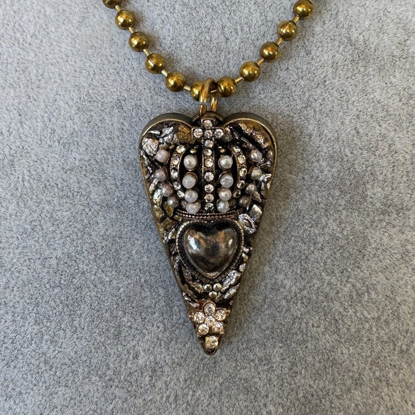 Embedded polymer heart pendant