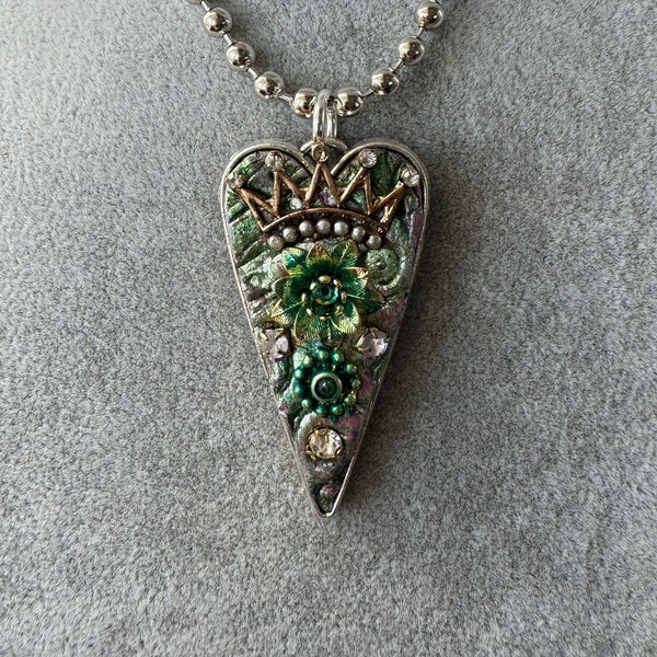 Embedded polymer heart pendant