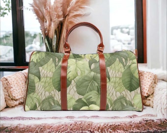 Pastel Green Tropical Waterproof Travel Bag, Jungle forest Monstera duffle bag with shoulder strap vegan leather handles, boho Hippies gift