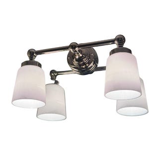 May include: A four-light vanity fixture with a polished chrome finish. The fixture features four white, bell-shaped glass shades. The light fixture is designed to be mounted on a wall.