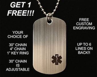 Puede incluir: Una placa de alerta médica de plata con un símbolo médico negro grabado en ella. La placa está unida a una cadena de plata. El texto "BUY 3 GET 1 FREE!!!" está en la parte superior de la imagen. El texto "FREE CUSTOM ENGRAVING UP TO 6 LINES ON BACK!!" está en el lado derecho de la imagen. El texto "YOUR CHOICE OF 30" CHAIN 4" CHAIN 1" KEY RING 30" CHAIN IS ADJUSTABLE" está en el lado izquierdo de la imagen. El texto "PREMIUM SATIN FINISH STAINLESS STEEL MEDICAL ALERT TAG" está en la parte inferior de la imagen.