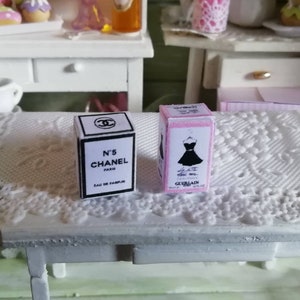 miniature dollhouse 2 small perfume imitation boxes. Height about 1.5 cm