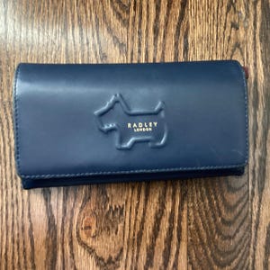 Scottie Radley London Flap Over Wallet Shadow Embossed Navy; wallets